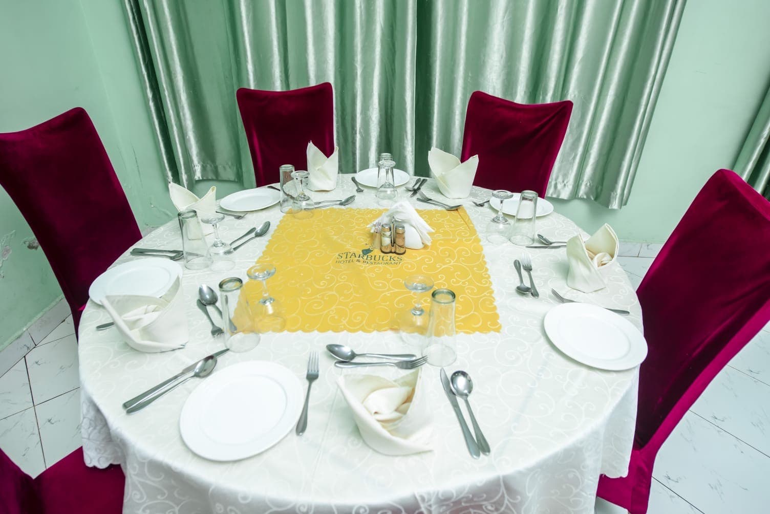 Formal table setting in the restaurant at The Starbucks Hotel, Eldoret