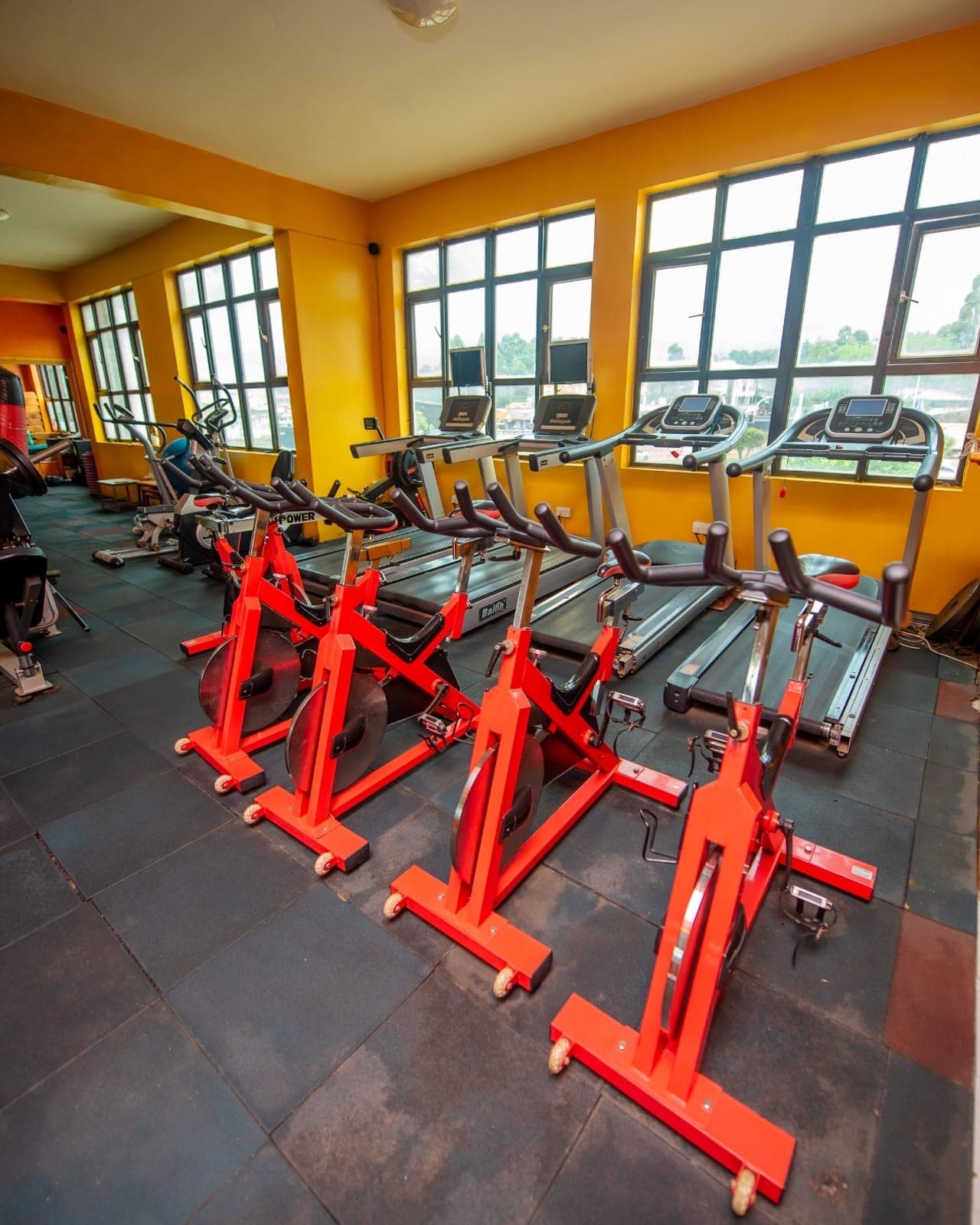 Row of treadmills at the fitness centre, The Starbucks Hotel, Eldoret