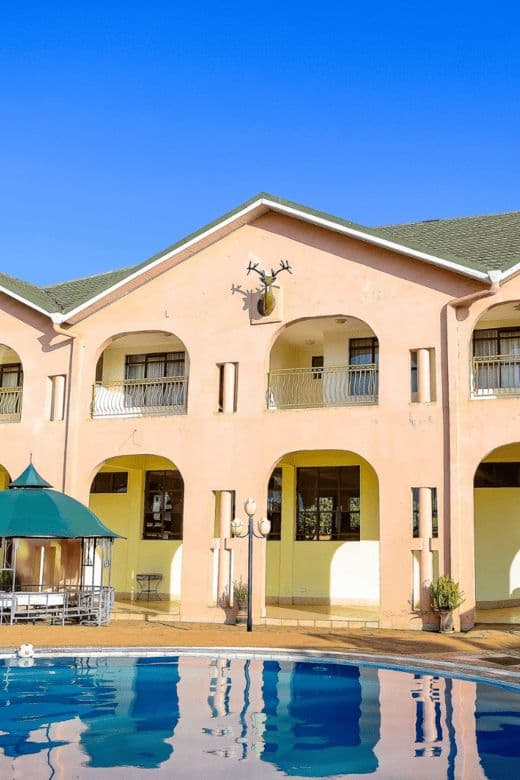 View of the hotel grounds and pool at The Starbucks Hotel, Eldoret