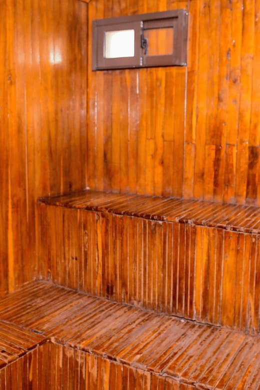 Wood-panelled sauna interior at The Starbucks Hotel, Eldoret